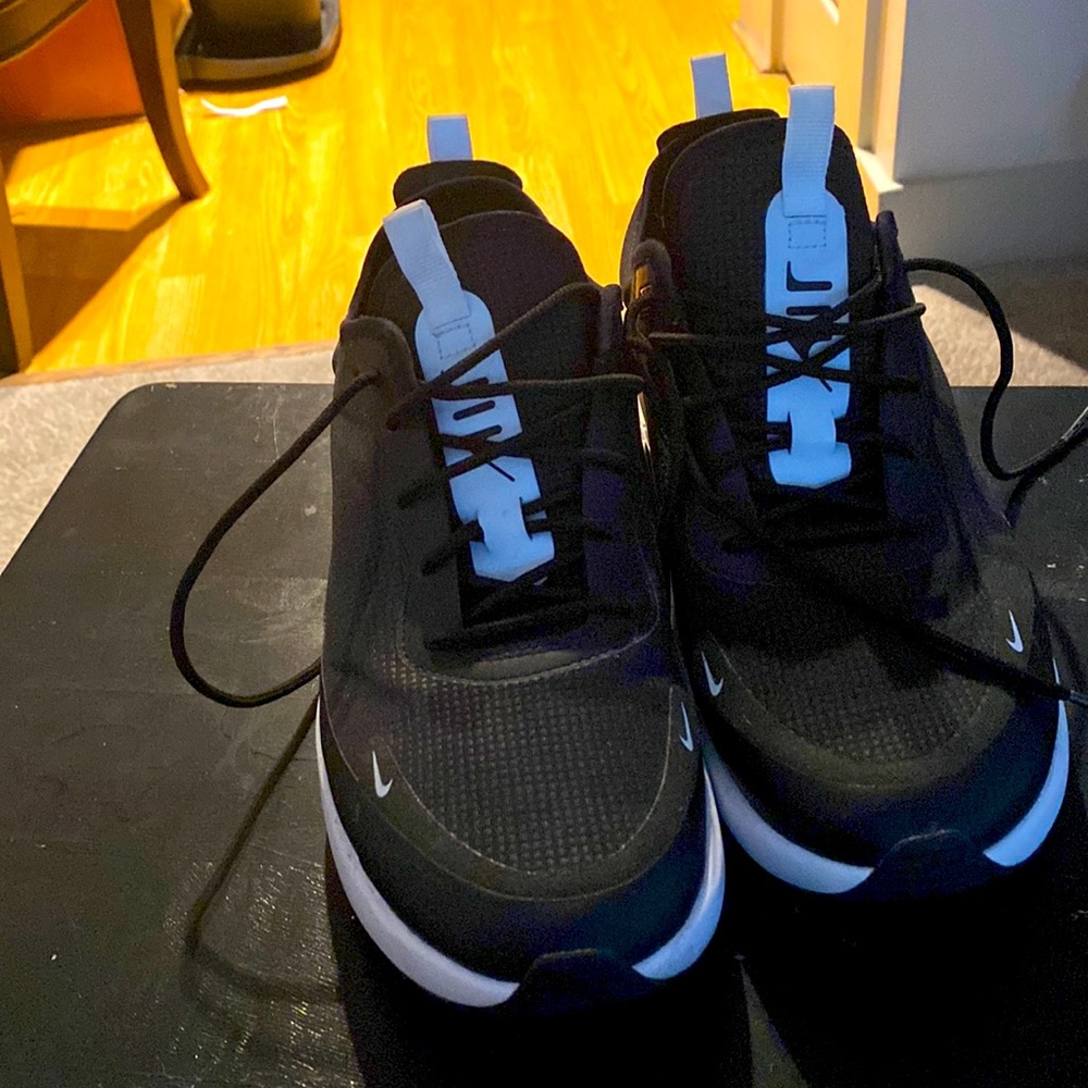 Woman’s size 9.5 Nike Air Max sneakers.